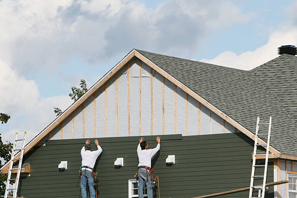 Professional Siding technician working in Jessup, MD